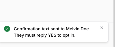 TDG Tracker confirmation: 'Confirmation text sent to [team member]. They must reply YES to opt in.' — showing consent is pending until the recipient replies YES